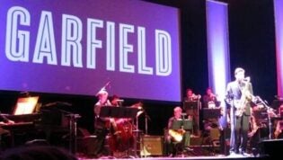 Garfield Jazz students on stage with Garfield Banner